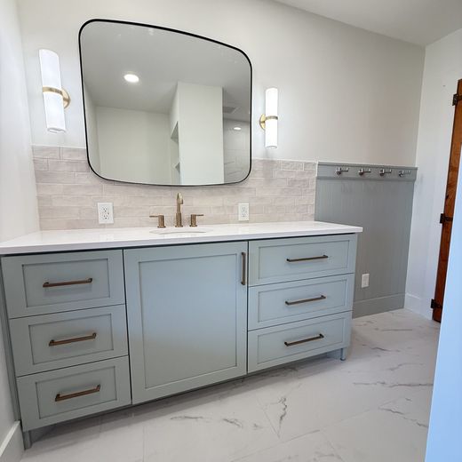 Single vanity with shiplap wainscoting