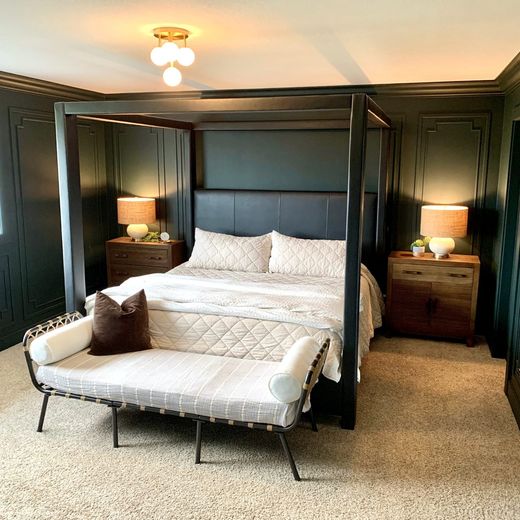 Bedroom with custom floor-to-ceiling wall paneling
